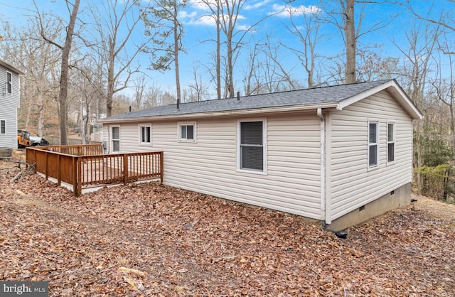 12452 White Horse Rd, Lusby, MD 20657 - back of house featuring crawl space, roof with shingles, and a wooden deck