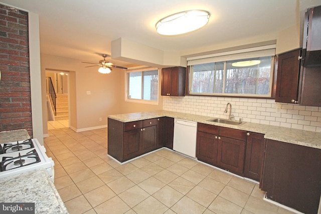 kitchen featuring light tile patterned flooring, sink, ceiling fan, white appliances, and backsplash