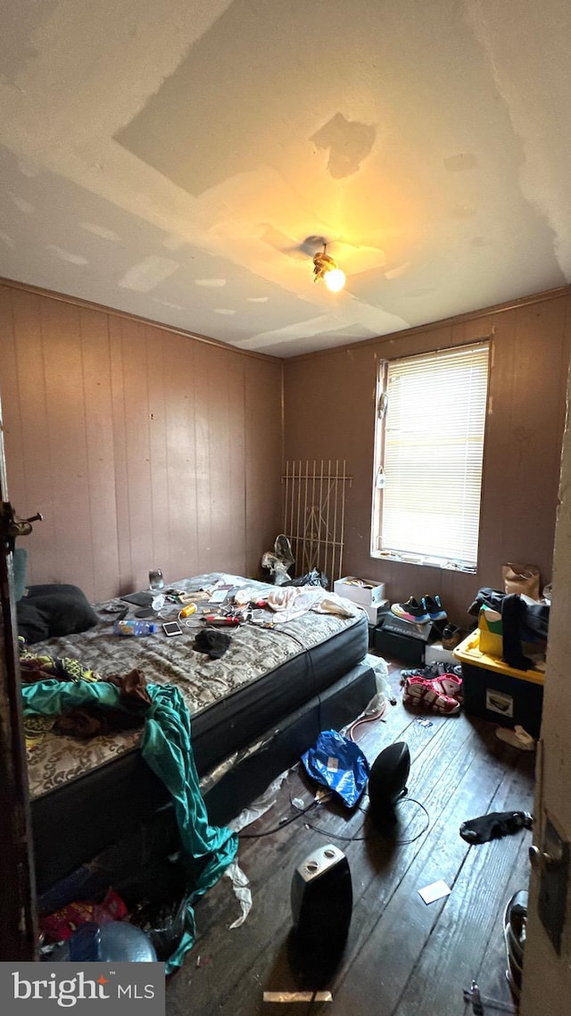 bedroom featuring wood-type flooring