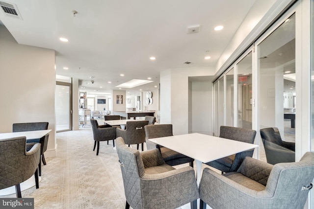 view of carpeted dining area