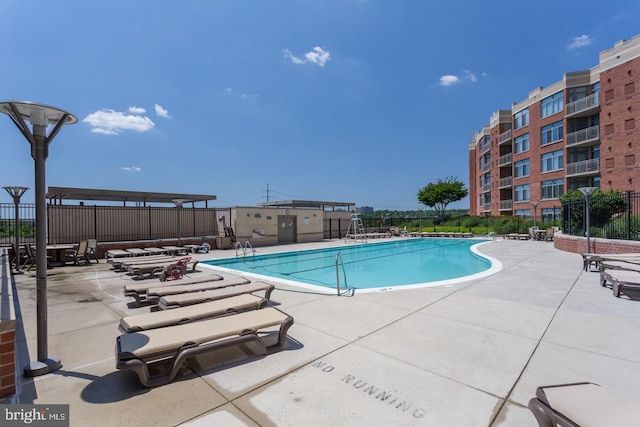 view of pool with a patio