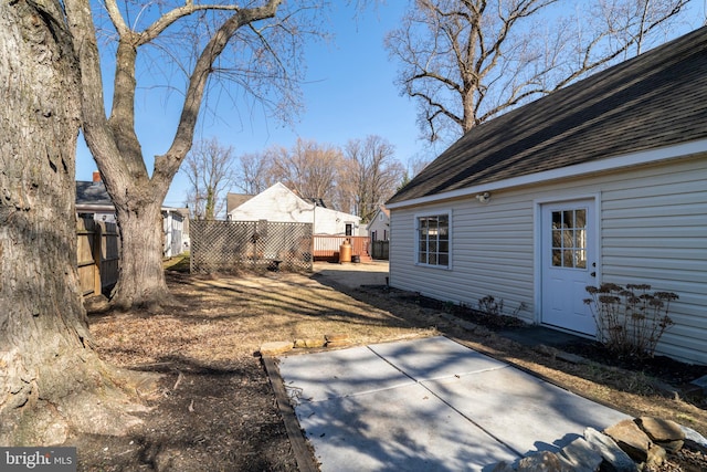 view of yard featuring a patio and fence