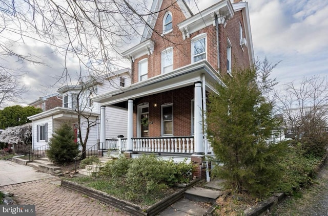 italianate home with covered porch