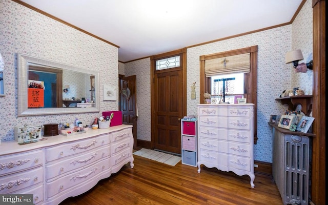 bedroom featuring dark wood-type flooring and ornamental molding