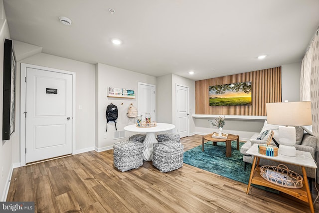 sitting room with hardwood / wood-style floors