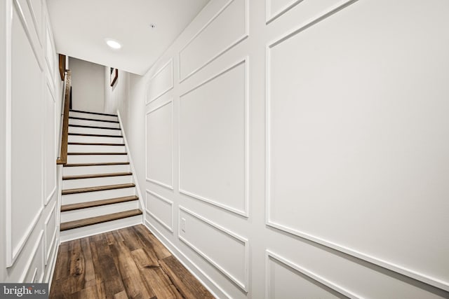 stairway with wood-type flooring