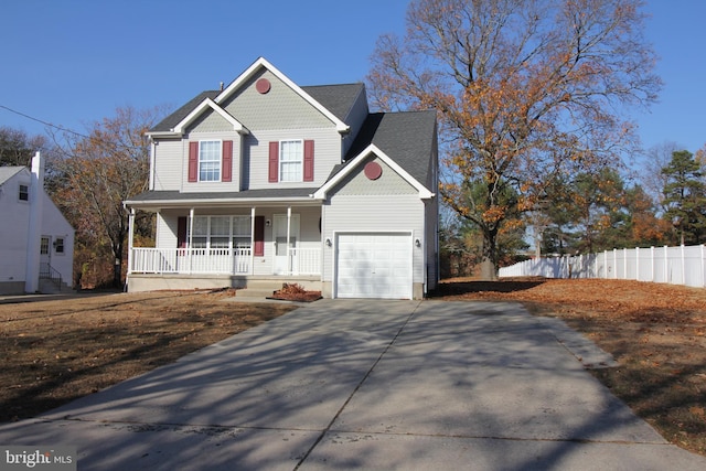 view of front facade featuring a porch and a garage