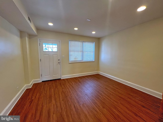 entrance foyer featuring hardwood / wood-style flooring