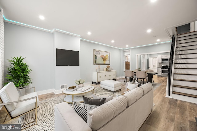 living room with hardwood / wood-style flooring