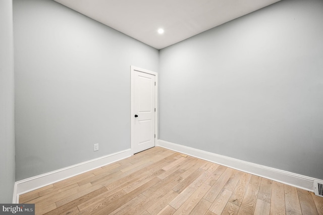 unfurnished room featuring light hardwood / wood-style flooring