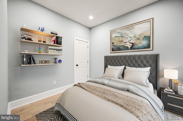 bedroom featuring hardwood / wood-style flooring