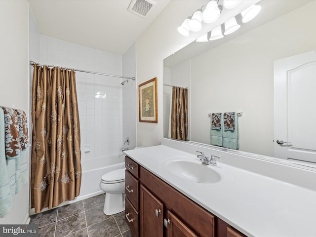 full bathroom featuring vanity, tile patterned flooring, toilet, and shower / bath combo with shower curtain