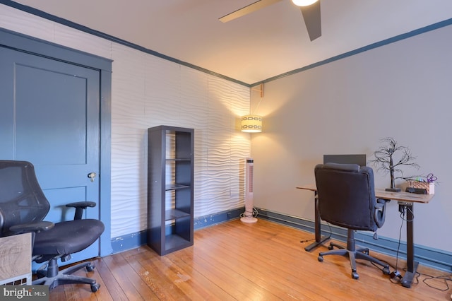 office with ceiling fan and hardwood / wood-style floors