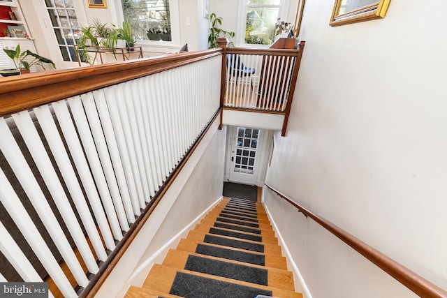 stairs featuring baseboards