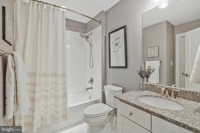 full bathroom with shower / tub combo with curtain, vanity, and toilet