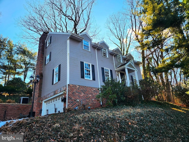 view of home's exterior with a garage