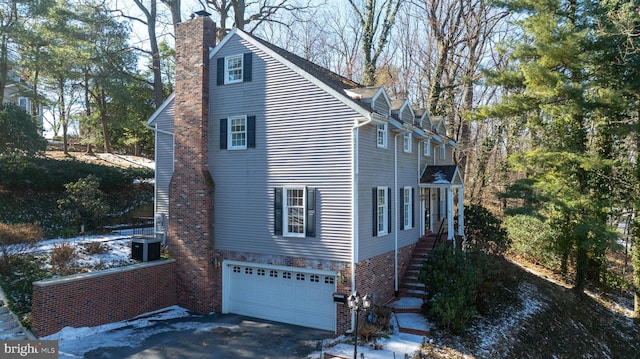 view of home's exterior with a garage