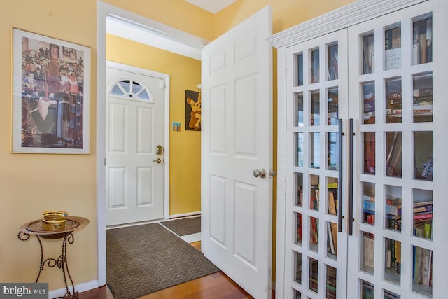 entrance foyer featuring hardwood / wood-style floors