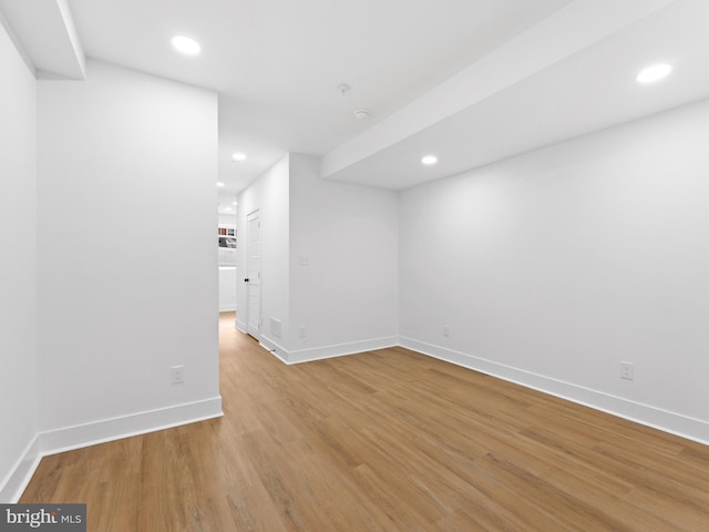 unfurnished room with light hardwood / wood-style flooring