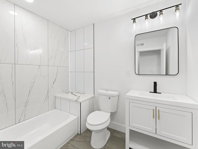 full bathroom with vanity, toilet, and tiled shower / bath combo