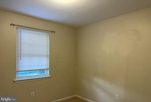 view of carpeted spare room