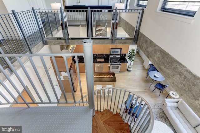 staircase featuring hardwood / wood-style floors