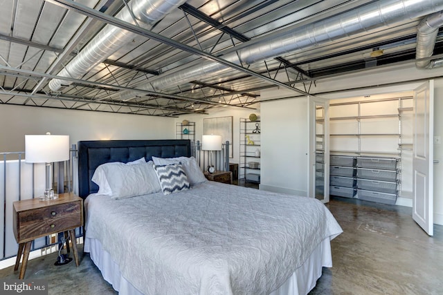 bedroom with concrete floors