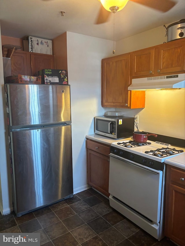 kitchen featuring ceiling fan and appliances with stainless steel finishes