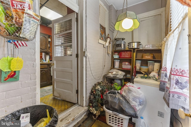 interior space with brick wall