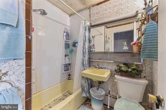 full bathroom featuring a baseboard radiator, sink, toilet, and shower / tub combo