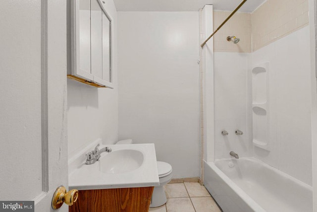 full bathroom with tile patterned floors, toilet,  shower combination, and vanity