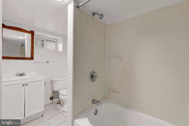 full bathroom featuring vanity, tile patterned flooring, toilet, and washtub / shower combination