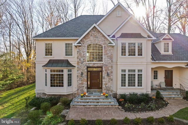 view of front property with a front lawn