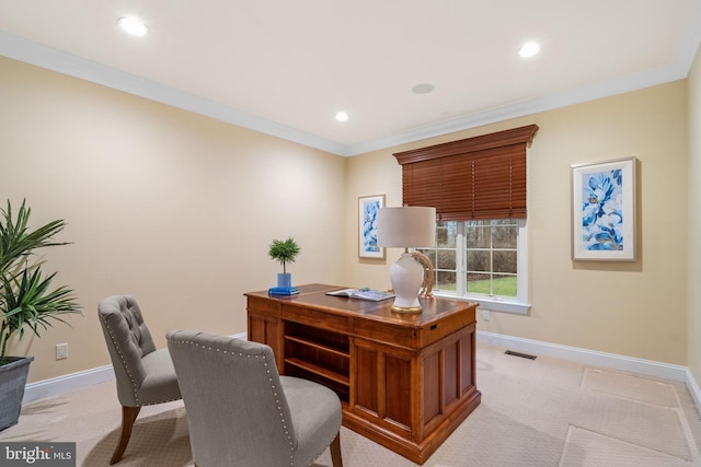 home office with ornamental molding and light colored carpet