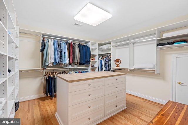 spacious closet with light wood-type flooring