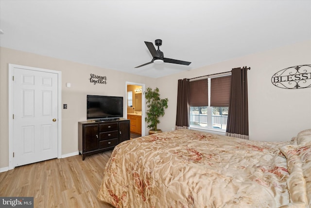 bedroom featuring ceiling fan, connected bathroom, and light hardwood / wood-style floors