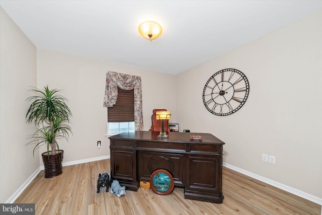 office space featuring light hardwood / wood-style floors