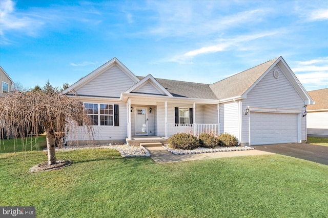 ranch-style home featuring a garage, a front yard, and covered porch