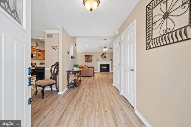 hallway featuring light hardwood / wood-style flooring