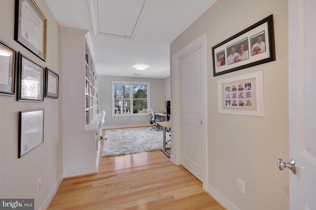 hall with light wood-type flooring