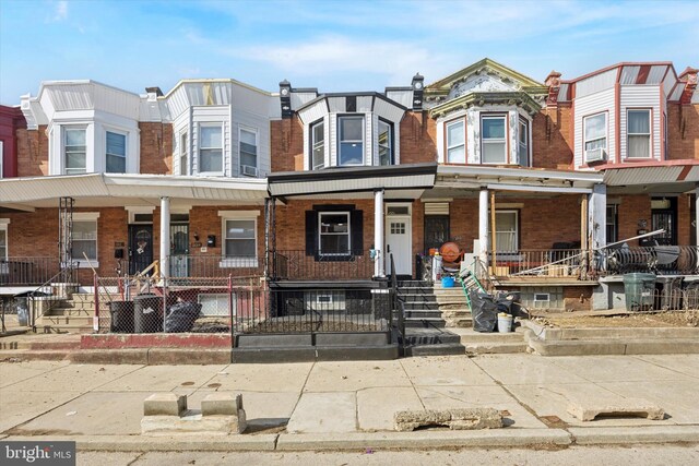 multi unit property featuring covered porch