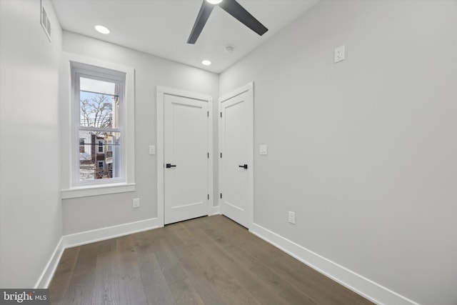 foyer entrance featuring ceiling fan and hardwood / wood-style floors