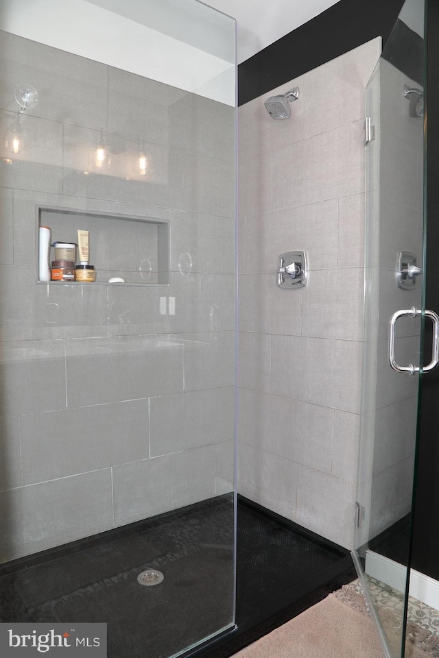 bathroom featuring a stall shower