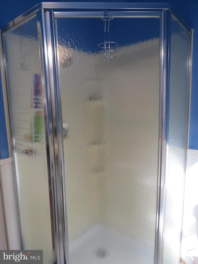 bathroom with an enclosed shower