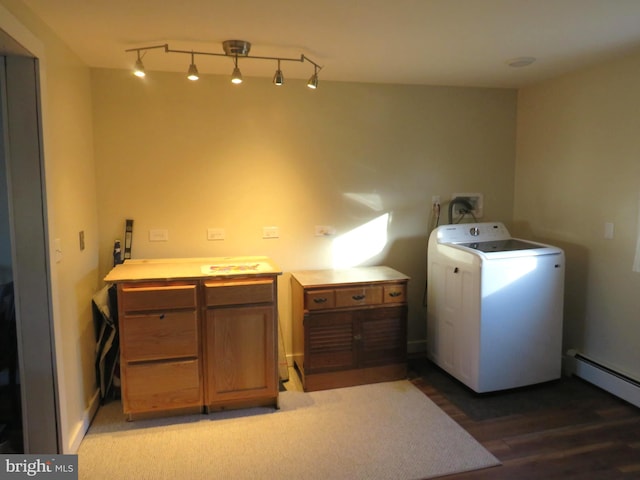 laundry room with washer / clothes dryer, hardwood / wood-style floors, cabinets, and a baseboard heating unit