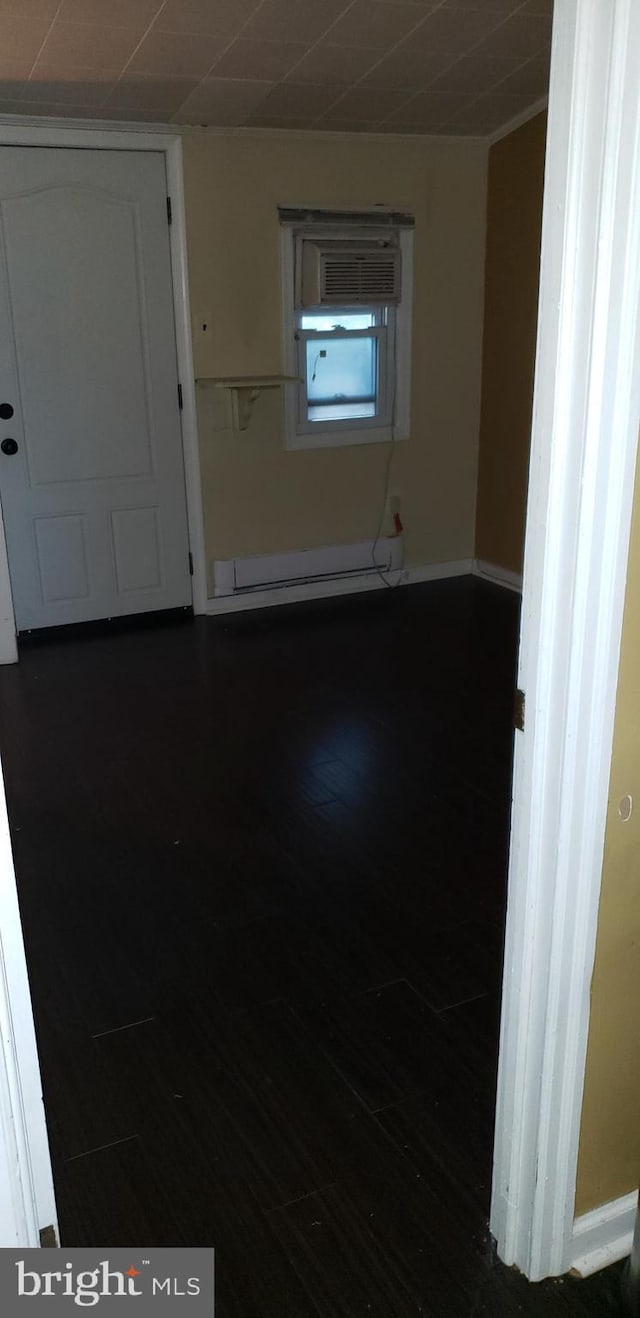 interior space with dark hardwood / wood-style floors