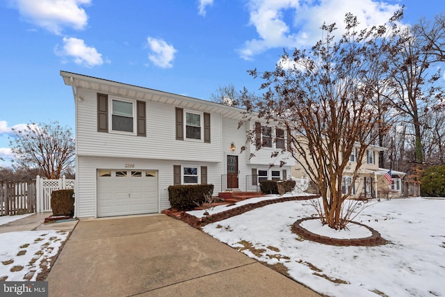 front of property with a garage