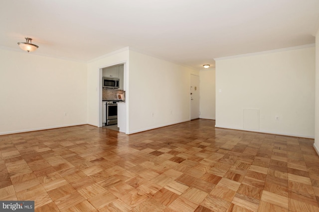 unfurnished room featuring light parquet flooring and ornamental molding