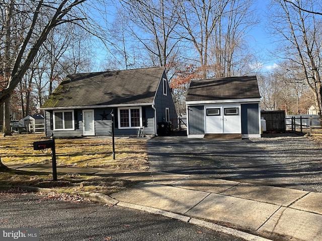 view of front of property featuring an outbuilding