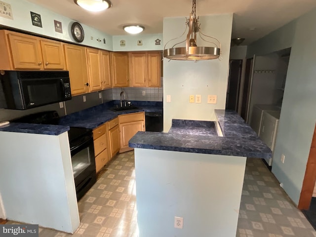 kitchen with sink, decorative light fixtures, black appliances, and decorative backsplash